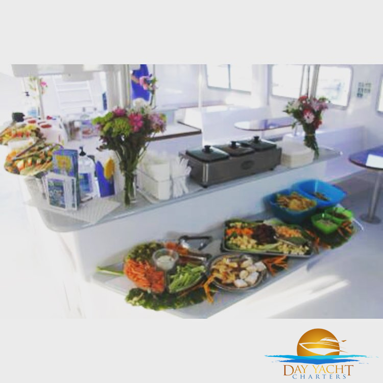 Private yacht with guests relaxing on the sundeck, Fajardo luxury boat rental